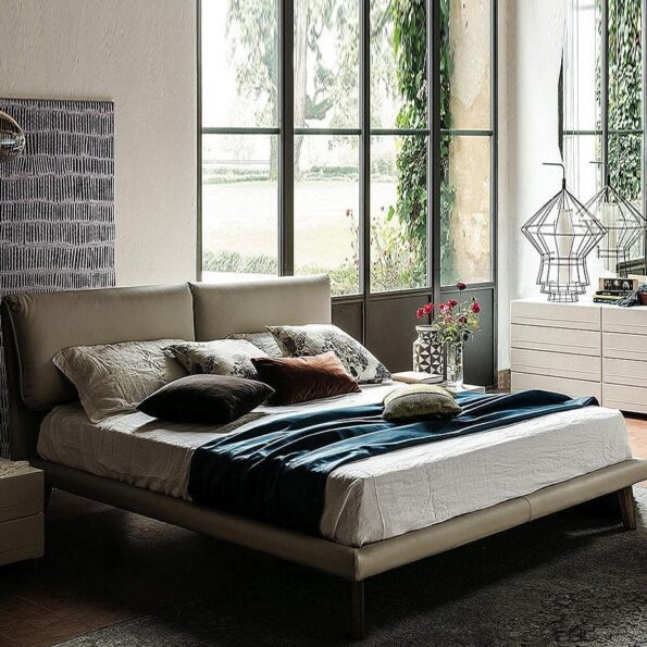 adam bed with blue sheets