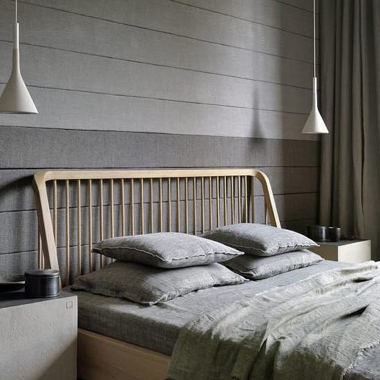 farmhouse bed with two pendant lights.